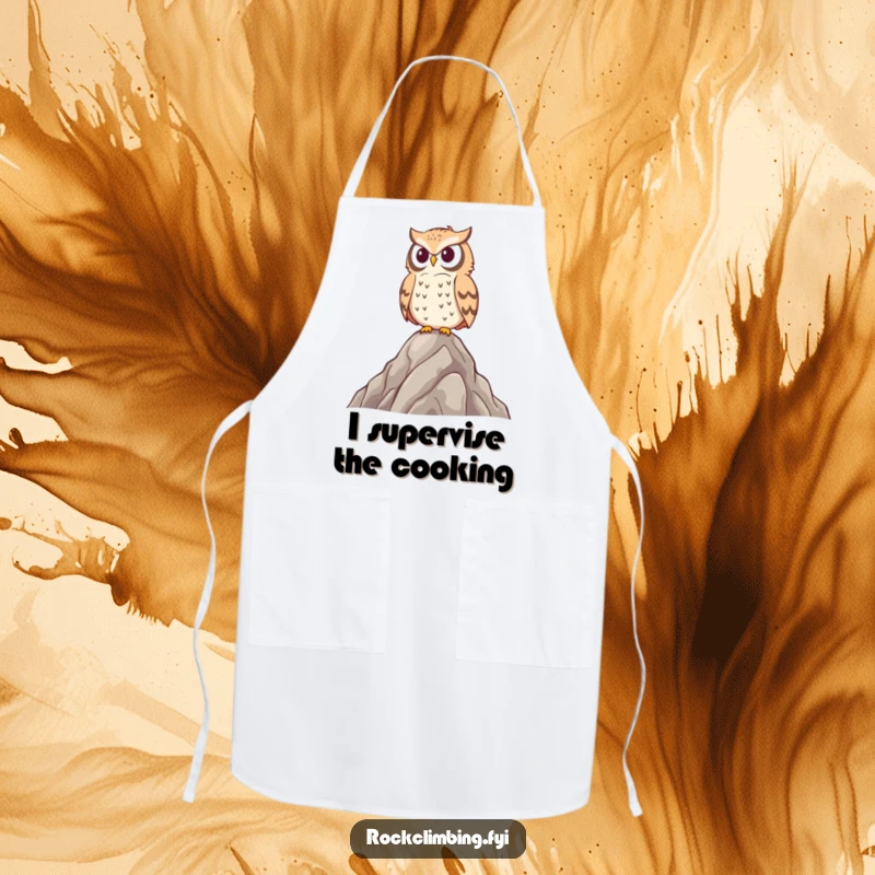Funny owl apron showing a proud bird on a rocky peak, perfect for cooking or baking with a humorous, watchful spirit.