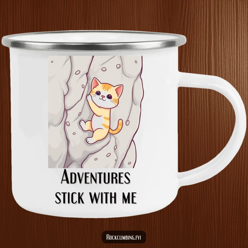 Funny cat camping mug showing a cat climbing a rock face with suction cups, designed for humorous adventures.
