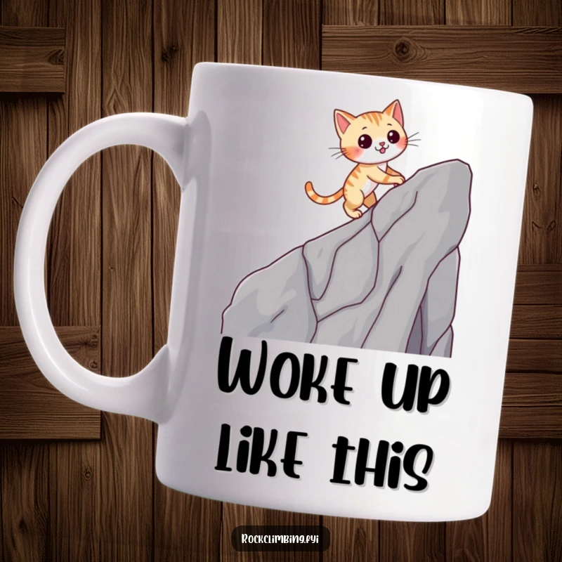 Funny cat mug featuring a nimble cat scaling a cliff with a wink, embodying agility and playful humor.