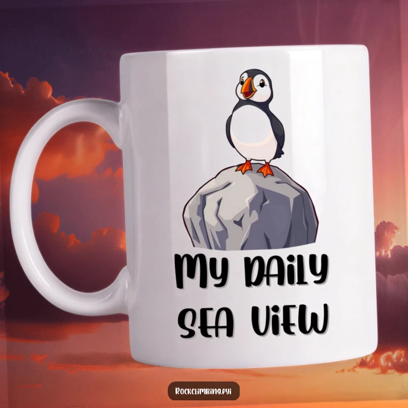 Funny mug featuring a delighted puffin perched high on a rock, gazing contentedly at the sea, embodying coastal charm.