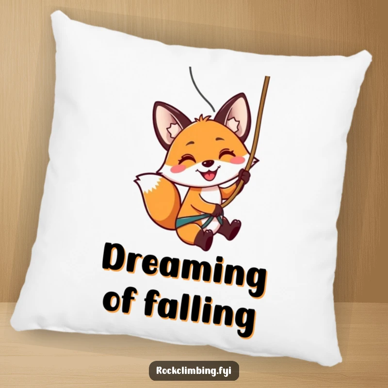Funny pillow with a smiling fox rappelling down a rock, bringing a sense of adventurous fun to any room.