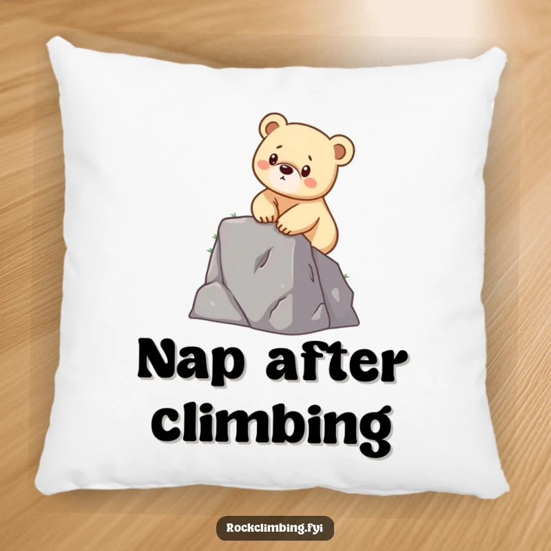 Funny pillow featuring a determined bear cub scaling a small cliff, adding humorous comfort and motivation.