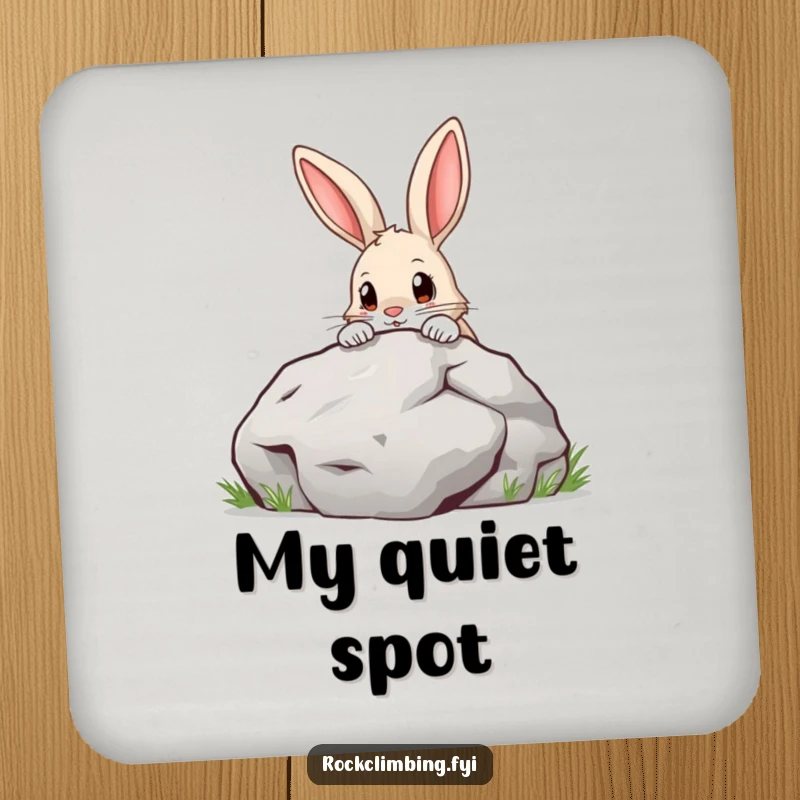 Funny Drink Coaster featuring a determined curious rabbit peeking over a large boulder, protecting tables from drink rings with style.