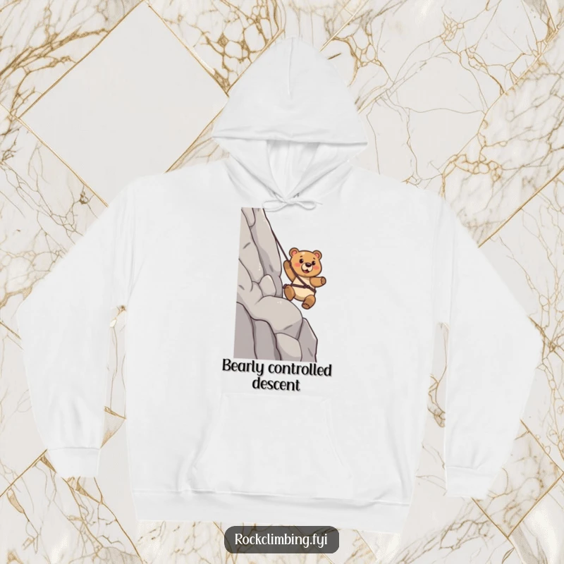 Funny Bear Hoodie: A determined bear rappels down a cliff with a confident stride, exuding strength and adventurous resolve.