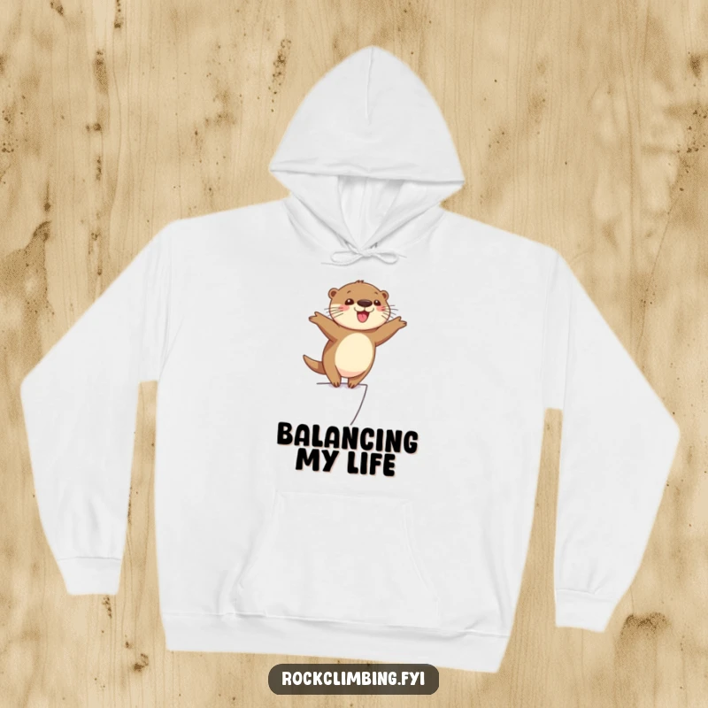 Funny cheerful otter balancing precariously on a narrow ledge with arms outstretched, looking happy and adventurous, cozy hoodie.