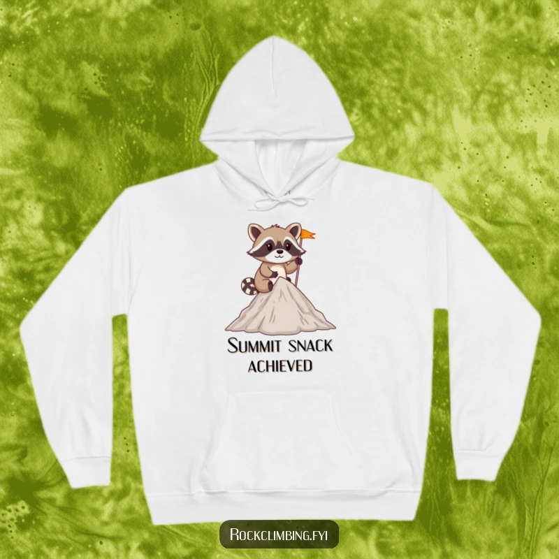 Funny mischievous raccoon planting a tiny flag at the summit of a small peak on a cozy hoodie.