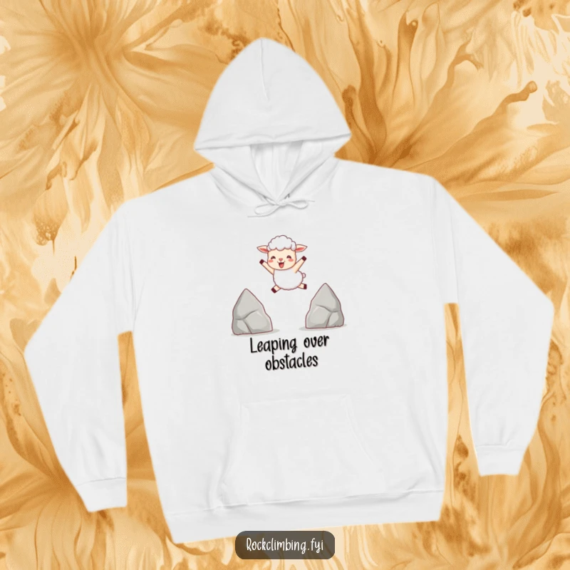 Funny hoodie depicting a delighted sheep energetically leaping between two pointed rocks, embodying fun and joy.