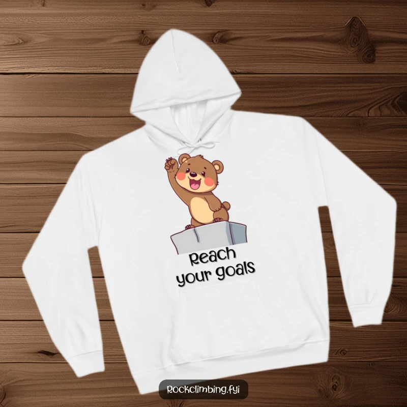 Funny Bear Cub Climbing Hoodie: A determined cub reaches for a ledge with a yelp, cozy and motivational.