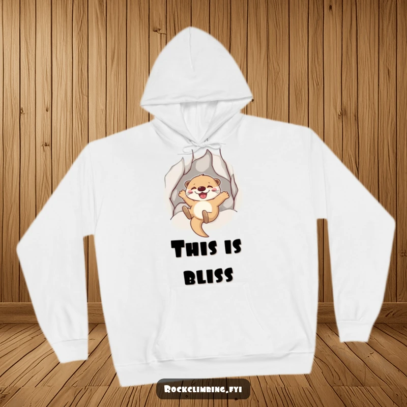 Funny Otter Sliding Hoodie: A joyful otter grins while sliding down a rock face, cozy and playful.
