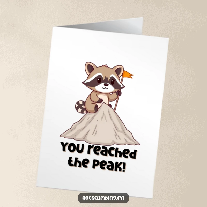 Funny Free Printable Congratulations Card featuring a mischievous raccoon planting a tiny flag at the summit of a peak.