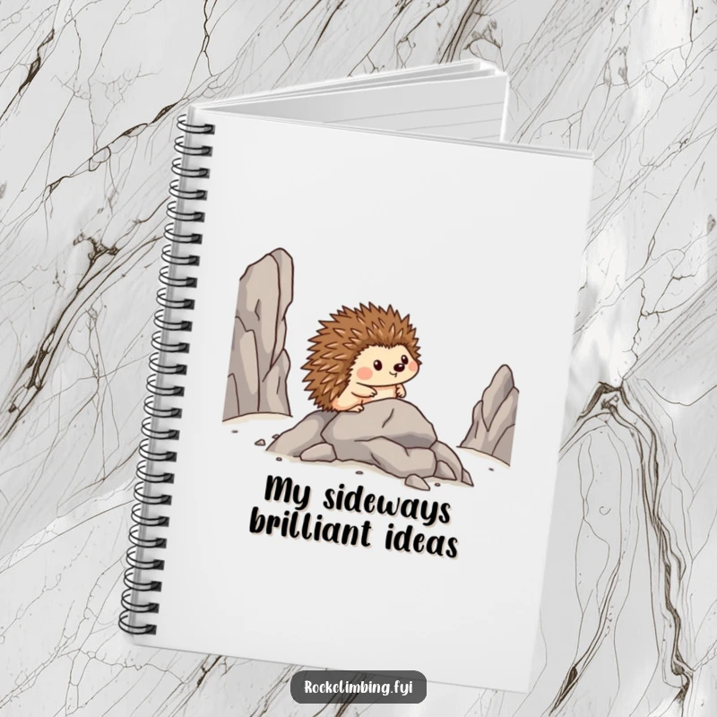 Funny notebook with a brave hedgehog inching sideways on rocks, looking pleased, perfect for jotting down funny ideas.