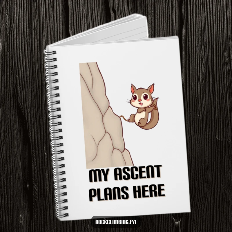 Funny squirrel notebook featuring a determined squirrel using a rope to climb a sheer cliff, perfect for jotting down adventures.