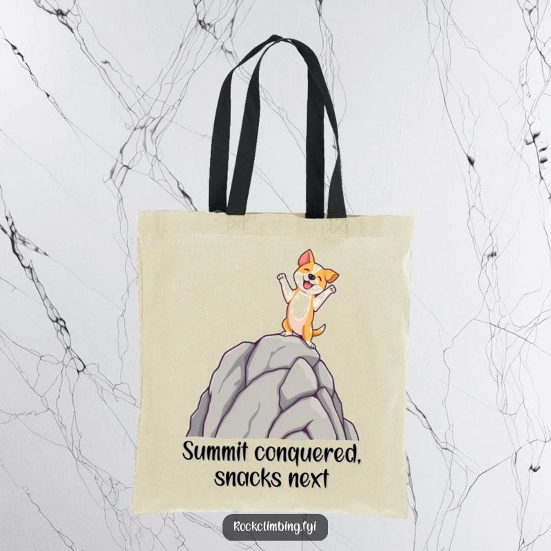 Funny dog tote bag illustrating a dog reaching the summit of a rock spire, a funny depiction of reaching the top.
